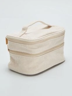 Una Trousse Da Bagno Con Doppio Scomparto